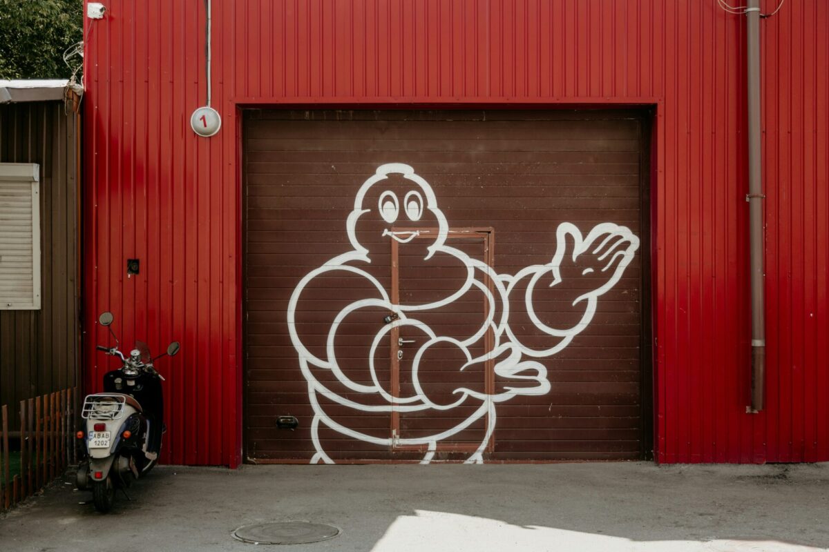 Michelin Man mascot logo examples in tire branding (www.unsplash.com)
