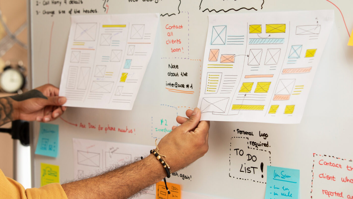 A UX designer planning the app layout 